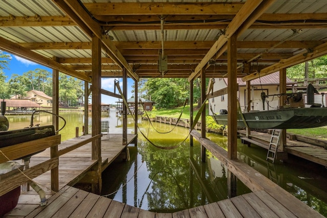 31 N Lakeview Dr, Point Blank, TX 77364 - dock area with boat lift and a water view