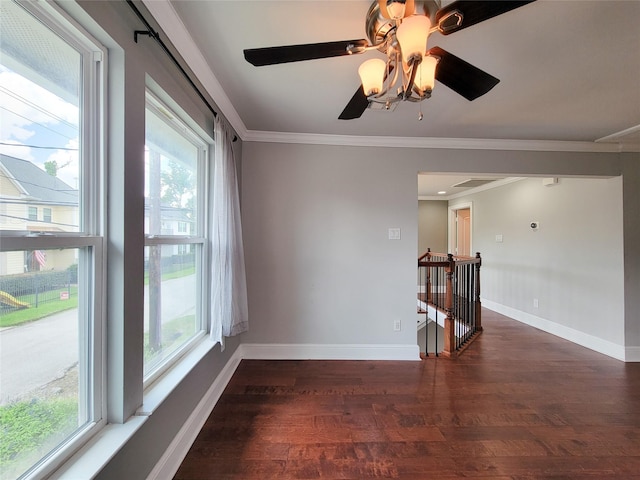 2608 Arlington St, Houston, TX 77008 - unfurnished room featuring wood finished floors, healthy amount of natural light, ornamental molding, and a ceiling fan