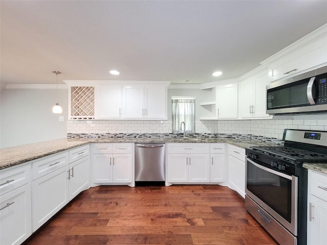 2608 Arlington St, Houston, TX 77008 - kitchen with appliances with stainless steel finishes, crown molding, tasteful backsplash, white cabinets, and open shelves