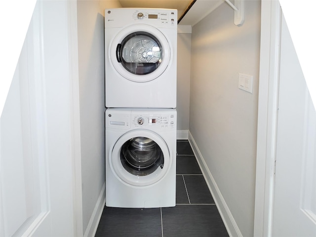 2608 Arlington St, Houston, TX 77008 - laundry room featuring stacked washing machine and dryer and tile patterned flooring