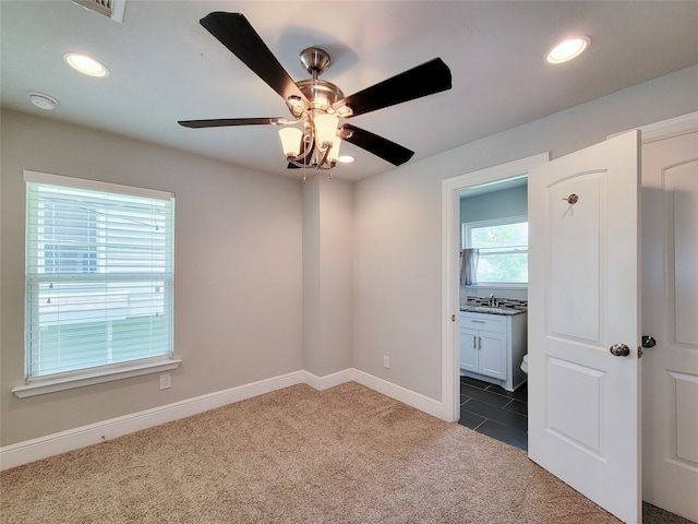 2608 Arlington St, Houston, TX 77008 - spare room featuring dark colored carpet, a ceiling fan, recessed lighting, and a smoke detector