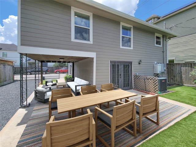 2608 Arlington St, Houston, TX 77008 - deck featuring french doors, a fenced backyard, an outdoor hangout area, outdoor dining space, and a patio