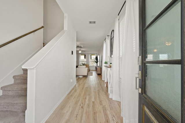 18402 Hilltop Climb Dr, Hockley, TX 77447 - hall with light wood finished floors and stairs