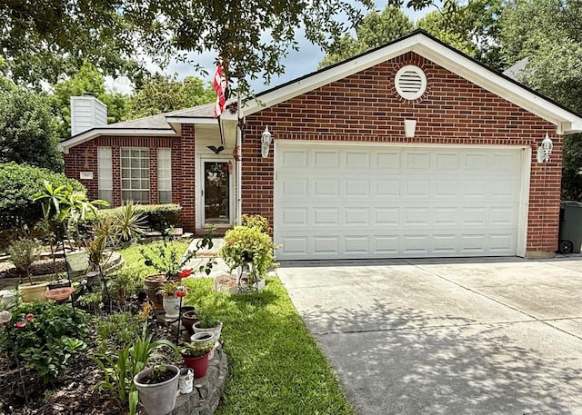 343 Lake View Dr, Montgomery, TX 77356 - single story home with brick siding, a chimney, driveway, and an attached garage