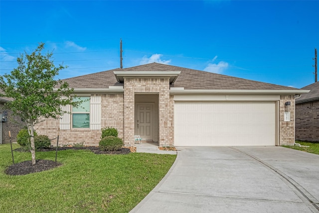 4315 Isoletta Ct, Katy, TX 77449 - view of front facade with brick siding, driveway, an attached garage, a front yard, and a shingled roof