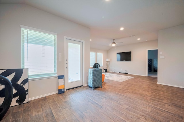 4315 Isoletta Ct, Katy, TX 77449 - living room featuring wood finished floors, ceiling fan, and recessed lighting