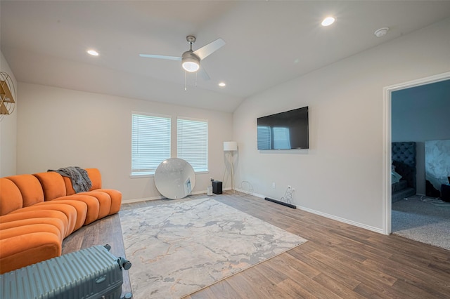 4315 Isoletta Ct, Katy, TX 77449 - living room featuring ceiling fan, wood finished floors, vaulted ceiling, and recessed lighting