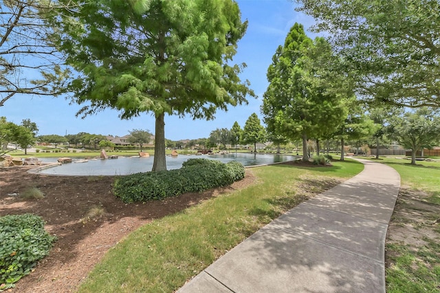 3030 Rabbit Brush Ln, Manvel, TX 77578 - view of community featuring a water view and a yard