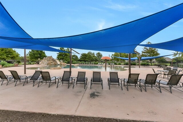 3030 Rabbit Brush Ln, Manvel, TX 77578 - view of patio / terrace with a community pool