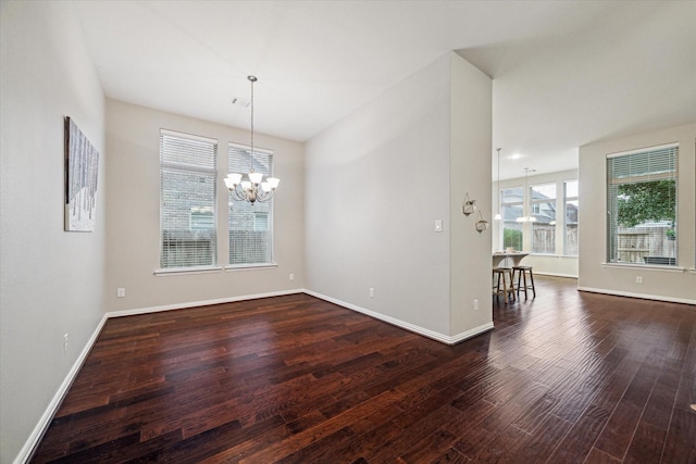 3030 Rabbit Brush Ln, Manvel, TX 77578 - unfurnished room featuring wood finished floors and a chandelier