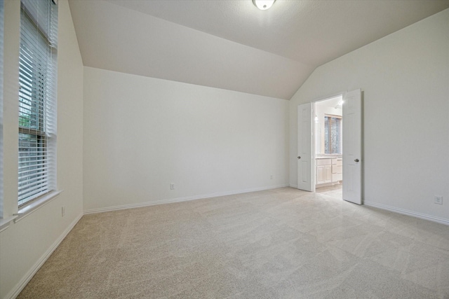3030 Rabbit Brush Ln, Manvel, TX 77578 - unfurnished room with light colored carpet and lofted ceiling