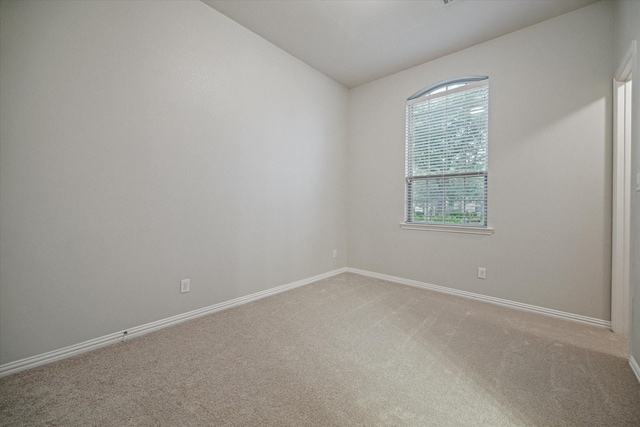 3030 Rabbit Brush Ln, Manvel, TX 77578 - spare room with carpet and vaulted ceiling