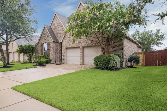 3030 Rabbit Brush Ln, Manvel, TX 77578 - view of front of house featuring concrete driveway, brick siding, and a shingled roof