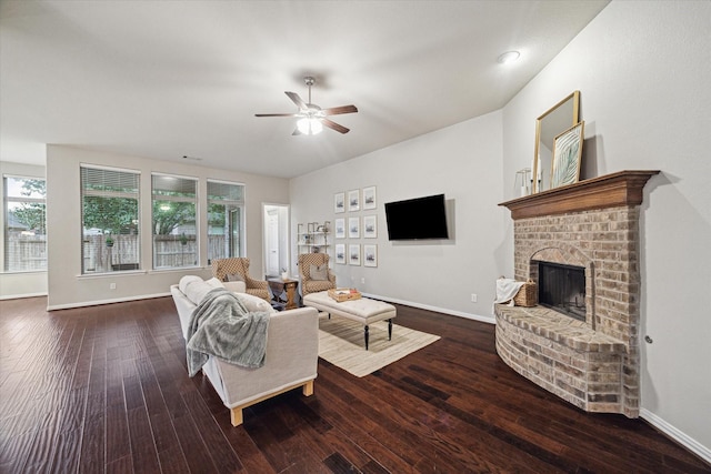 3030 Rabbit Brush Ln, Manvel, TX 77578 - living area with a ceiling fan, a brick fireplace, and hardwood / wood-style floors