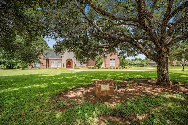 3610 Pembrooke Dr, Richmond, TX 77406 - obstructed view of property with a front yard