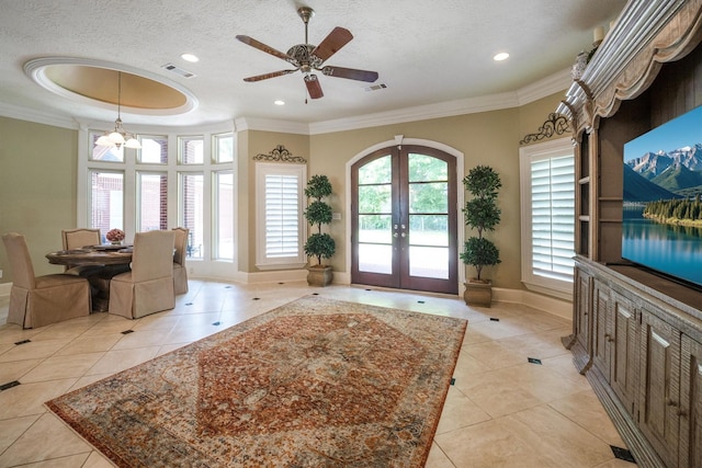 3610 Pembrooke Dr, Richmond, TX 77406 - entryway featuring ornamental molding, light tile patterned floors, french doors, a textured ceiling, and recessed lighting