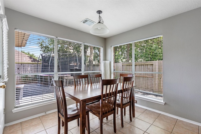 18618 Atascocita Forest Dr, Humble, TX 77346 - dining space with light tile patterned floors