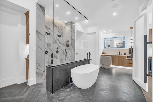 5602 Ella Lee Ln, Houston, TX 77056 - bathroom with a marble finish shower, vanity, a freestanding bath, and recessed lighting