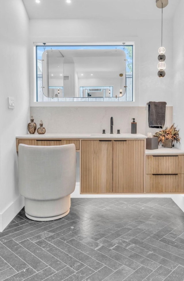 5602 Ella Lee Ln, Houston, TX 77056 - bathroom featuring plenty of natural light, vanity, recessed lighting, and brick patterned floors