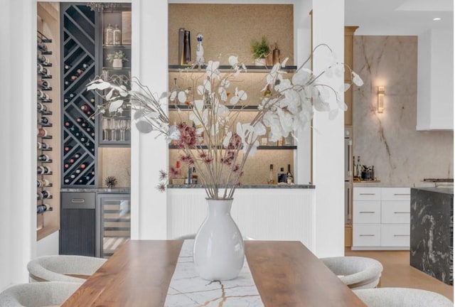 5602 Ella Lee Ln, Houston, TX 77056 - dining space featuring a dry bar and wine cooler