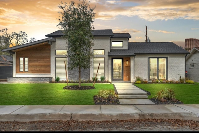 5602 Ella Lee Ln, Houston, TX 77056 - view of front of property featuring a front yard and brick siding