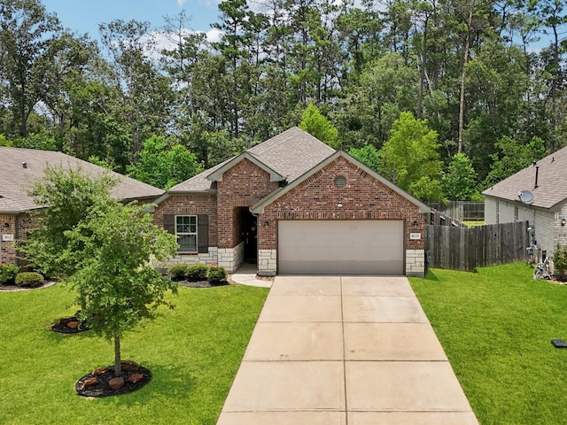 16129 Dockside St, Crosby, TX 77532 - view of front facade featuring an attached garage, brick siding, a shingled roof, and driveway