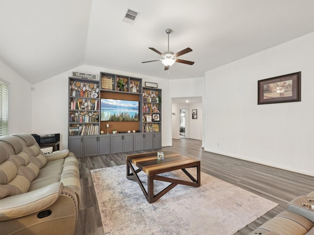 16129 Dockside St, Crosby, TX 77532 - living room with wood finished floors, a ceiling fan, and vaulted ceiling