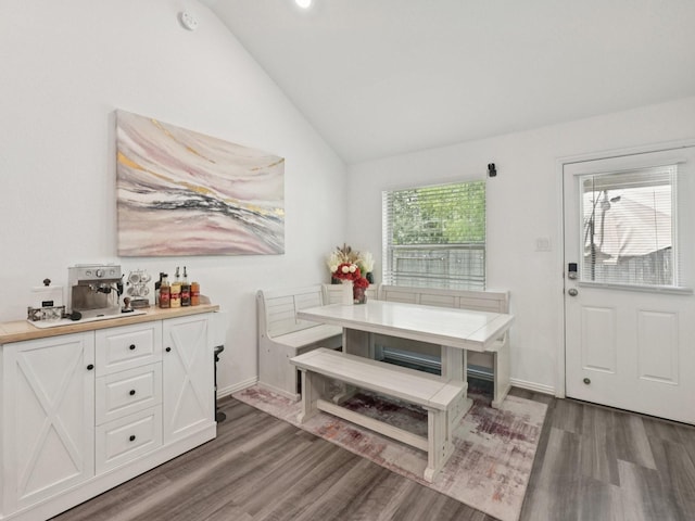 16129 Dockside St, Crosby, TX 77532 - dining space with wood finished floors and lofted ceiling