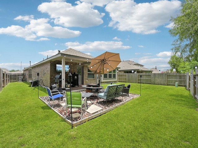 16129 Dockside St, Crosby, TX 77532 - fenced backyard featuring a fire pit