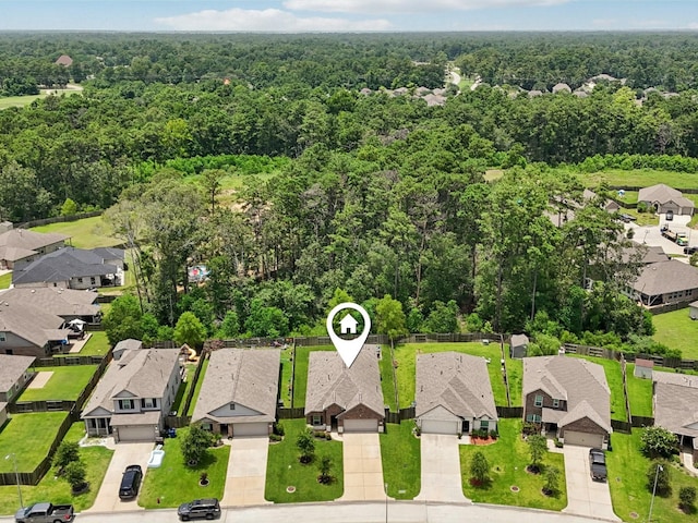 16129 Dockside St, Crosby, TX 77532 - aerial perspective of suburban area featuring a forest