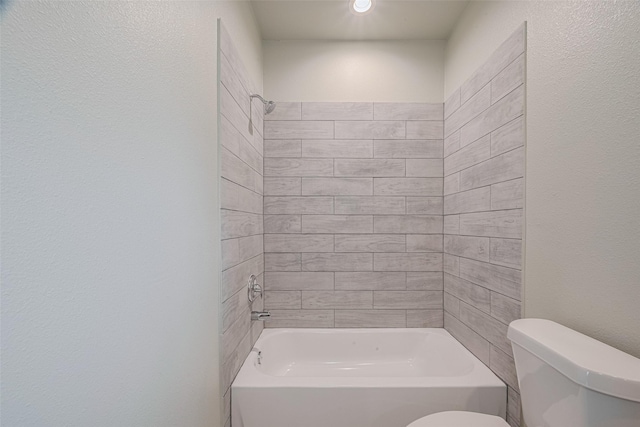 1909 Oregon St, Baytown, TX 77520 - bathroom featuring toilet and bathing tub / shower combination