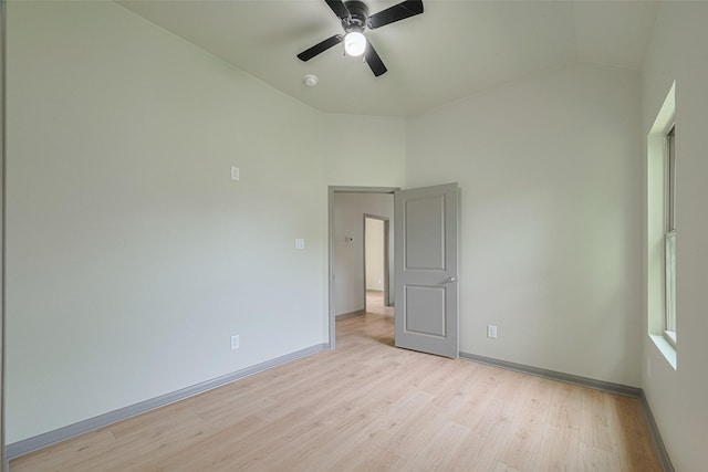 1909 Oregon St, Baytown, TX 77520 - empty room featuring lofted ceiling, light wood-style flooring, a ceiling fan, and a smoke detector