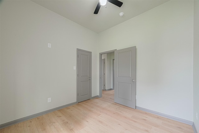 1909 Oregon St, Baytown, TX 77520 - spare room with a ceiling fan, light wood-style floors, and a smoke detector