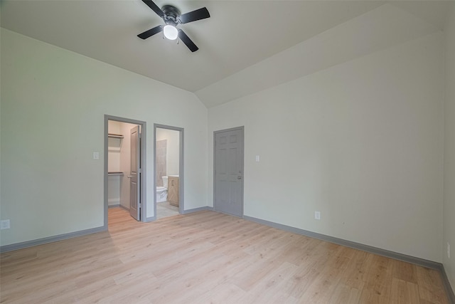 1909 Oregon St, Baytown, TX 77520 - unfurnished room with lofted ceiling, light wood finished floors, and a ceiling fan