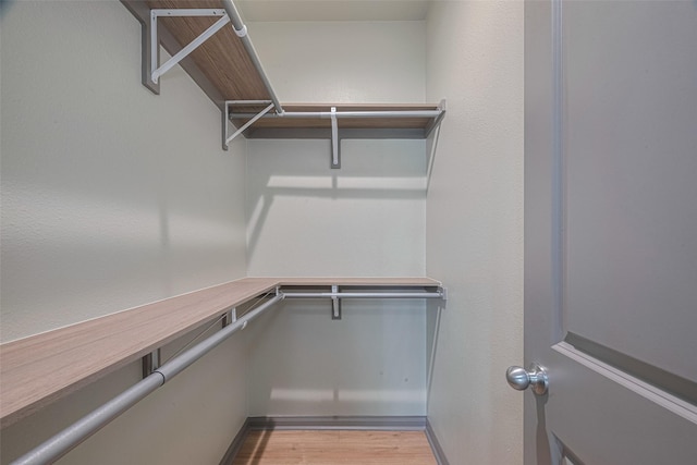 1909 Oregon St, Baytown, TX 77520 - spacious closet featuring light wood-type flooring