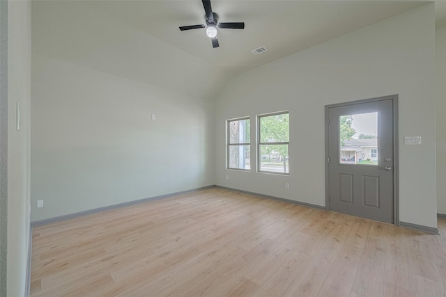 1909 Oregon St, Baytown, TX 77520 - spare room featuring light wood finished floors, lofted ceiling, and ceiling fan