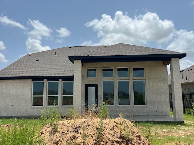 5339 Acapulco Mist Dr, Katy, TX 77493 - back of property with roof with shingles and brick siding
