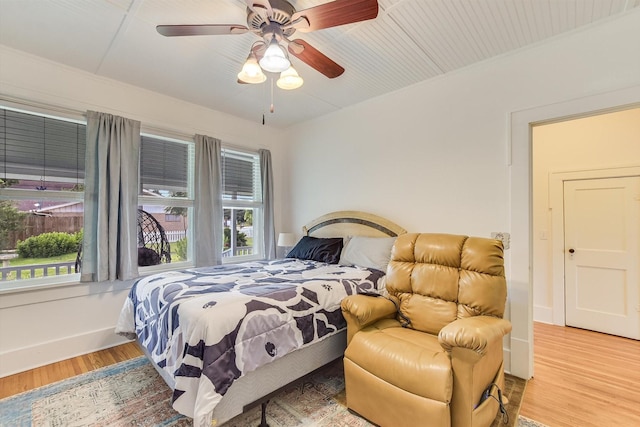 864 N Franklin St, La Grange, TX 78945 - bedroom featuring wood finished floors and ceiling fan
