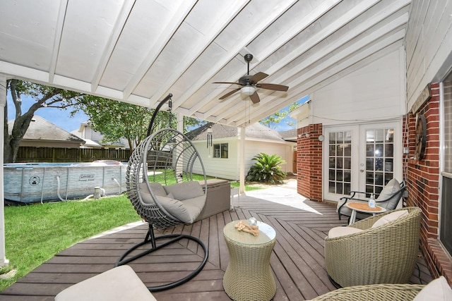 1503 Pine Ridge Ln, Pearland, TX 77581 - deck featuring a ceiling fan, a fenced backyard, french doors, and an outbuilding