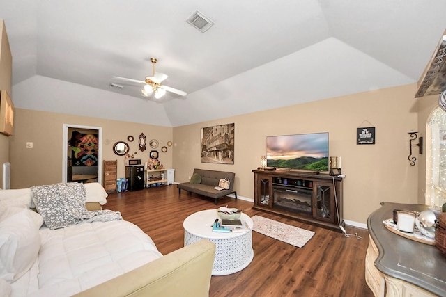1503 Pine Ridge Ln, Pearland, TX 77581 - living area with dark wood-type flooring, a ceiling fan, and lofted ceiling