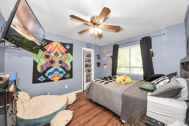 1503 Pine Ridge Ln, Pearland, TX 77581 - bedroom with wood finished floors and ceiling fan