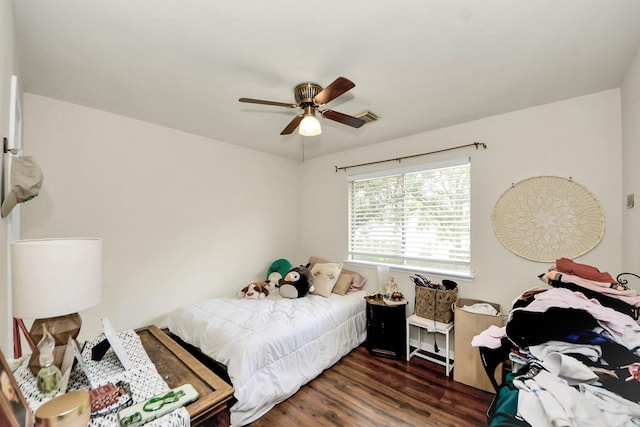 1503 Pine Ridge Ln, Pearland, TX 77581 - bedroom featuring wood finished floors and a ceiling fan