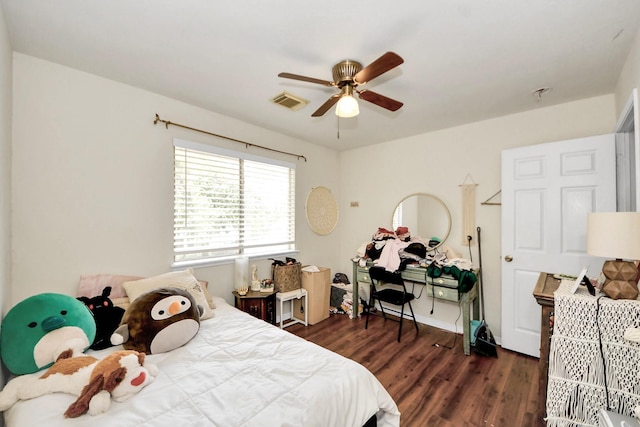 1503 Pine Ridge Ln, Pearland, TX 77581 - bedroom with dark wood finished floors and a ceiling fan