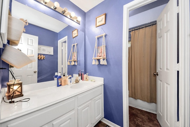 1503 Pine Ridge Ln, Pearland, TX 77581 - bathroom with vanity and baseboards