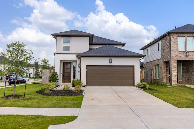 8722 Riverton Ridge Rd, Cypress, TX 77433 - view of front facade with stucco siding, an attached garage, concrete driveway, and a shingled roof