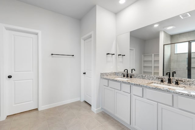 8722 Riverton Ridge Rd, Cypress, TX 77433 - full bath featuring a shower stall, double vanity, tile patterned flooring, and a spacious closet