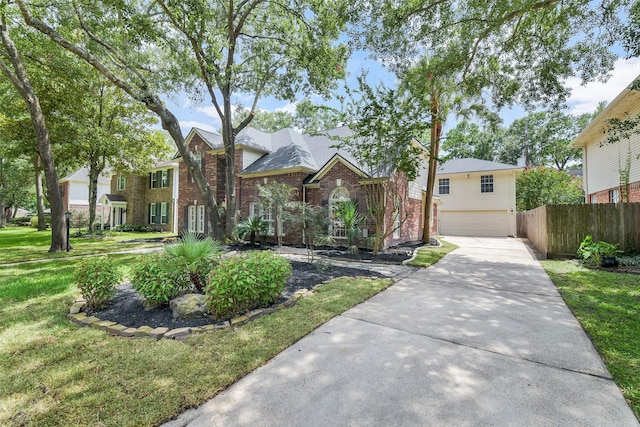 12911 Bristol Berry Dr, Cypress, TX 77429 - view of front of property with brick siding, a garage, and driveway