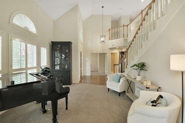 12911 Bristol Berry Dr, Cypress, TX 77429 - sitting room featuring high vaulted ceiling, ornamental molding, carpet, and stairs