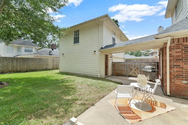 12911 Bristol Berry Dr, Cypress, TX 77429 - fenced backyard with a patio area and a gate