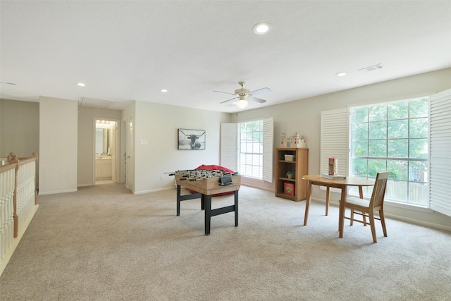 12911 Bristol Berry Dr, Cypress, TX 77429 - rec room with light carpet, ceiling fan, attic access, and recessed lighting